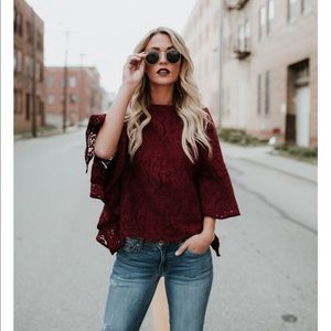 Winged lace blouse